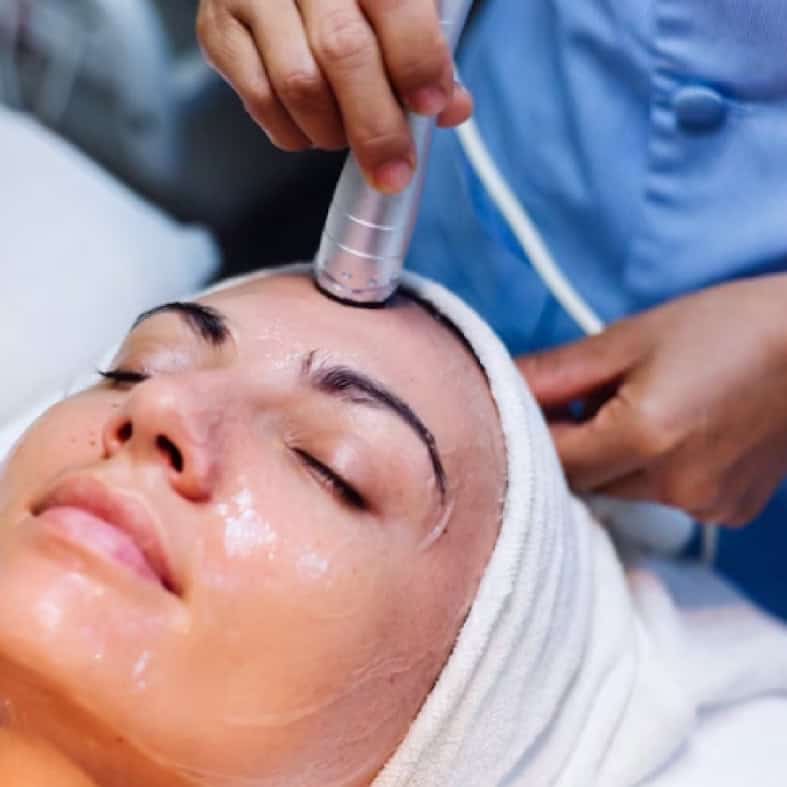 A person receives expert skin care during a facial at an NY Medical Spa in Brooklyn & Queens County.